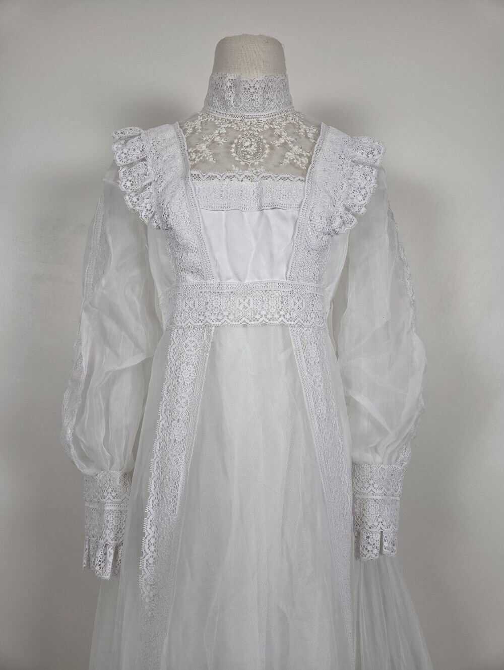 Victorian-Inspired White Lace Bridal Gown with High Neck and Sheer Puff Sleeves - Picture 12 of 13